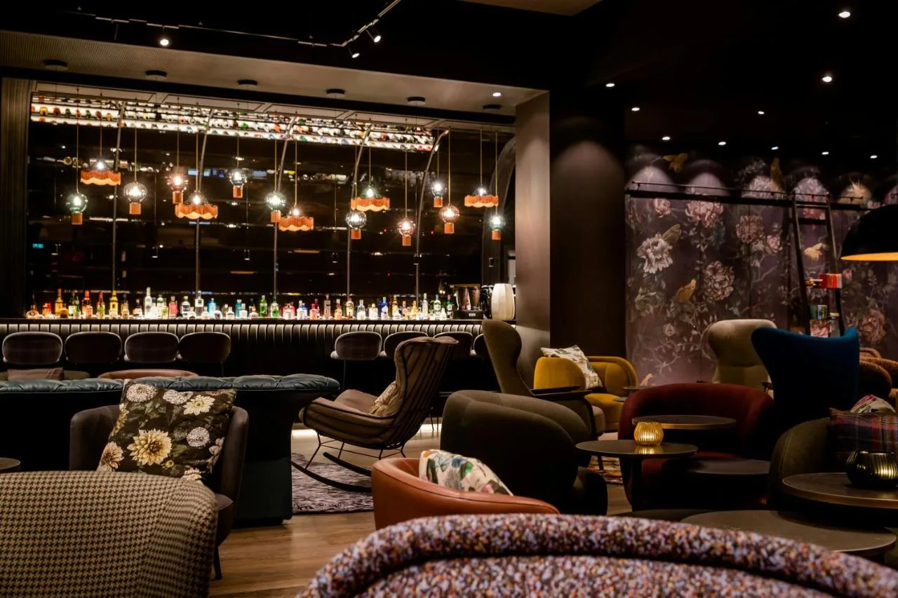 Restaurant with bar seating at Motel One Manchester-St. Peter's Square